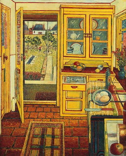Painted kitchen interior with yellow cabinets, tiled floor, and garden view through doorway