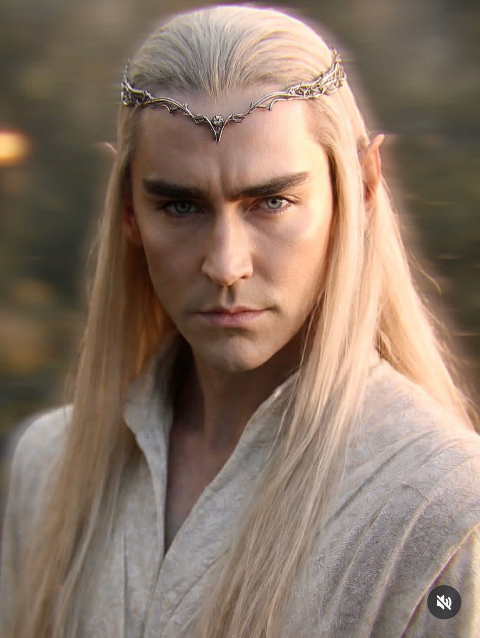 Portrait of blonde elf character Thranduil wearing silver circlet with long hair and white robes