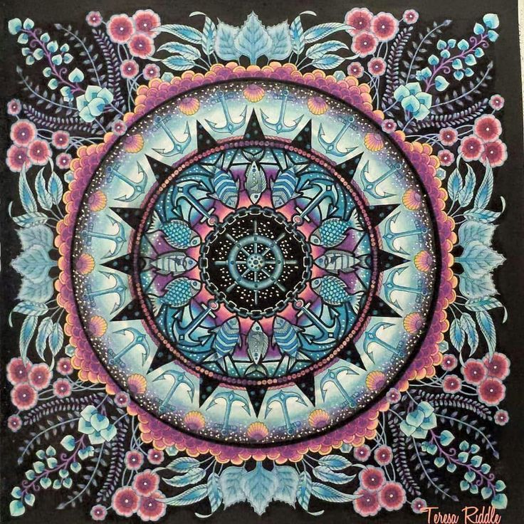 Circular mandala with turquoise and pink floral motifs in symmetrical layers on dark background