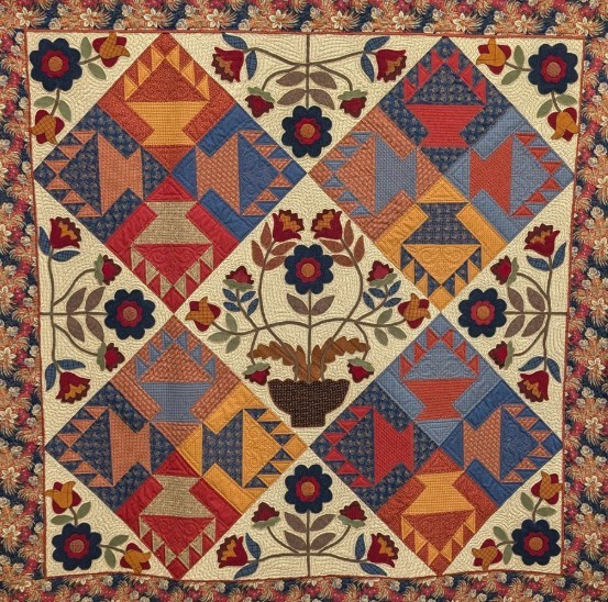 Traditional patchwork quilt with geometric star patterns and floral blocks in red, blue, and tan colors