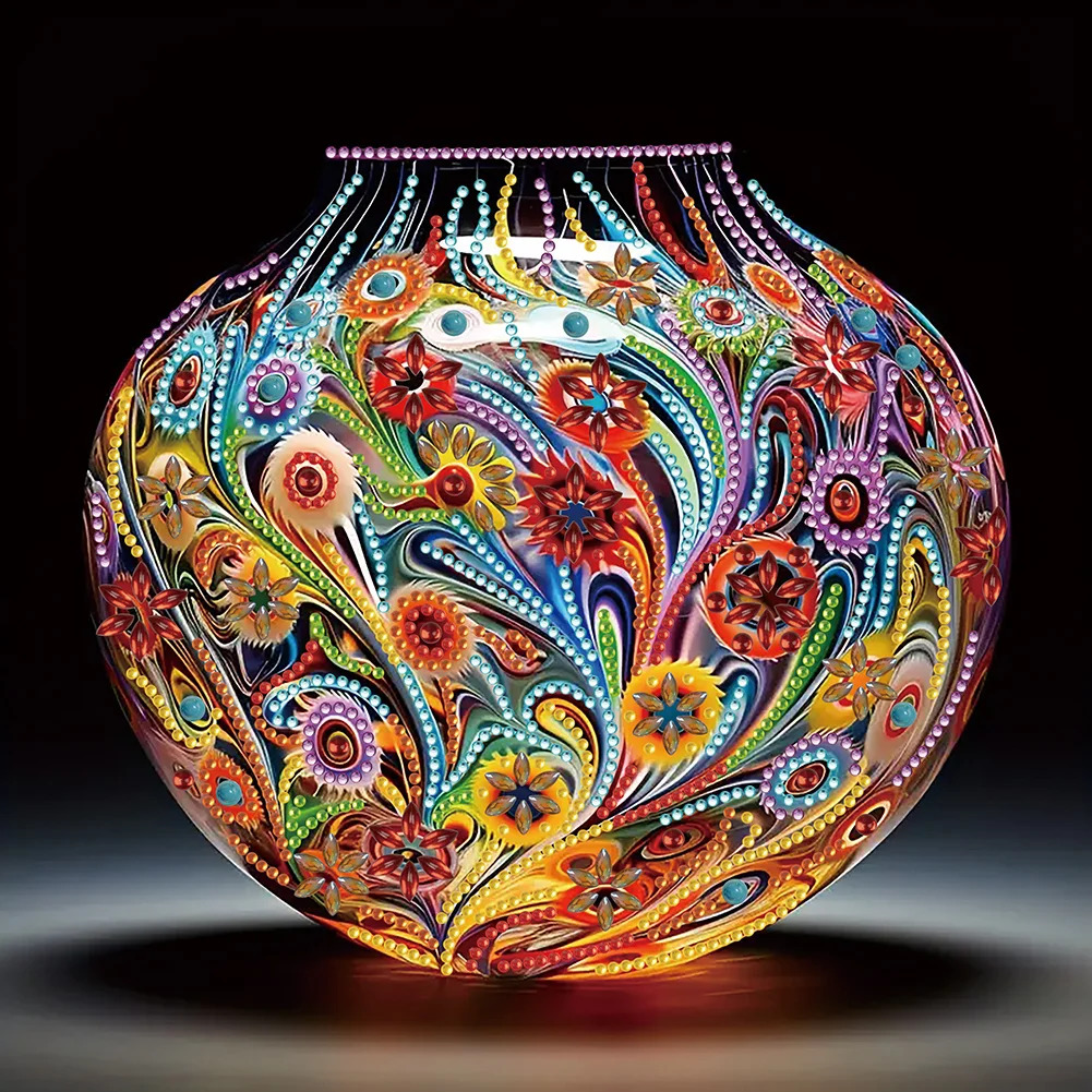 Round ceramic vase decorated with intricate colorful paisley and floral motifs against black background