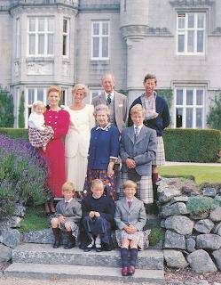 Royal family group photo at Balmoral Castle with adults and children on stone steps