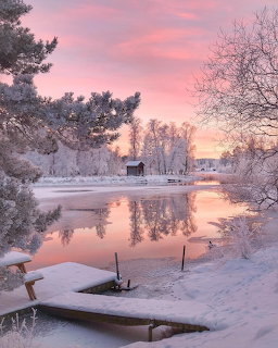 Snowy Lakeside Sunrise