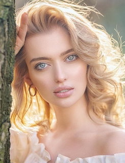 Portrait of blonde woman with blue eyes in white off-shoulder top outdoors