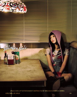 Girl in Hoodie at Cafe