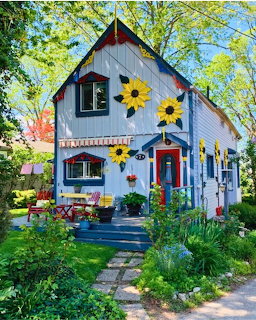 Pretty cottage house with garden surroundings