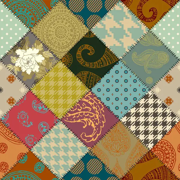 Colorful patchwork quilt with varied patterns including houndstooth, paisley, florals, and geometric designs