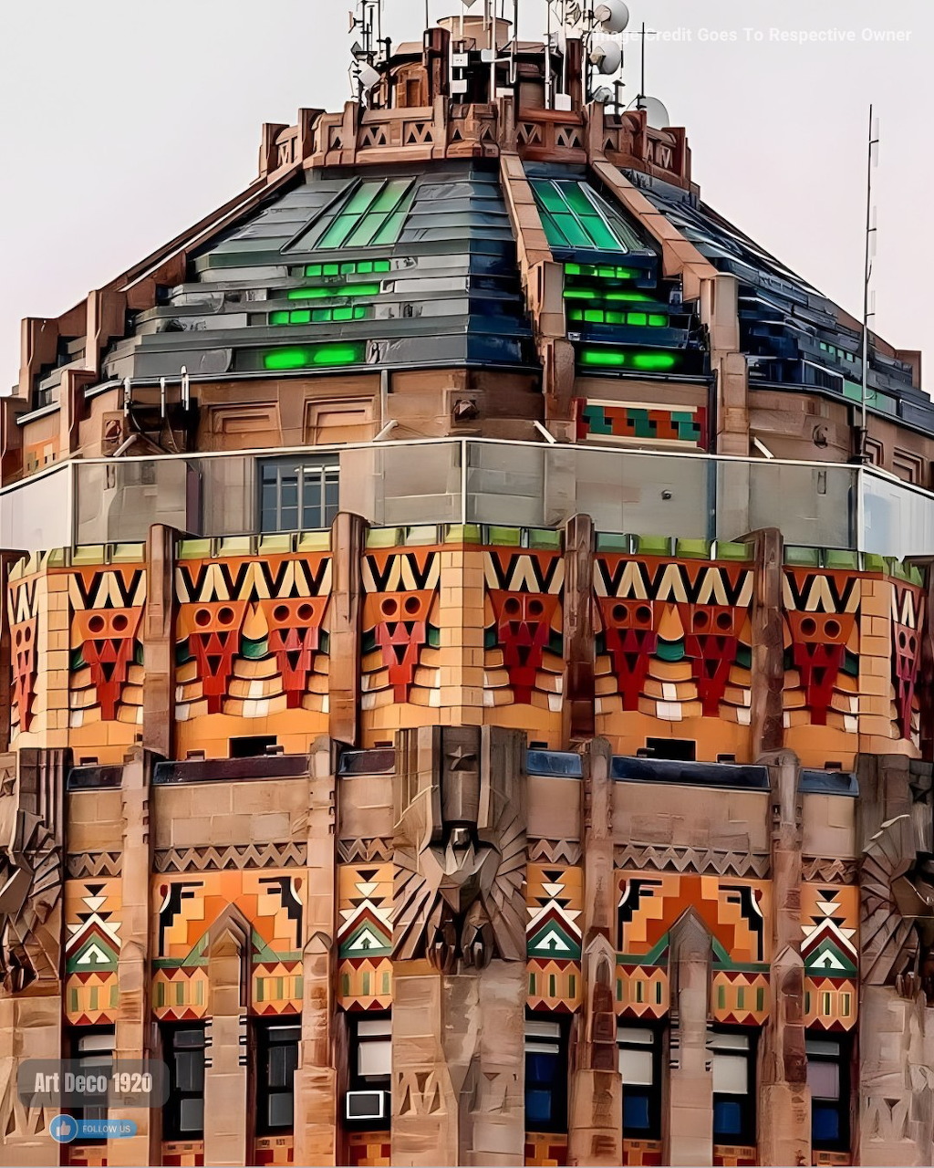 Close-up of an Art Deco building facade with colorful geometric patterns and a tiered rooftop