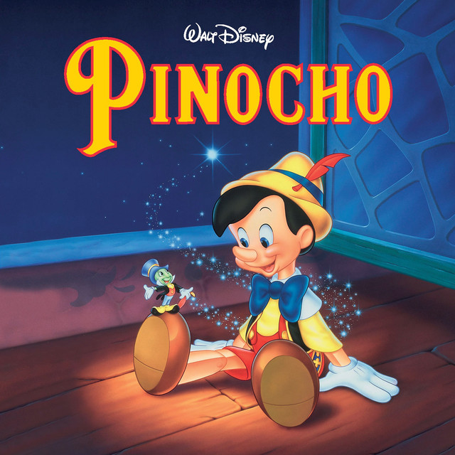 Disney's Pinocchio sitting as wooden puppet with Jiminy Cricket on striped candle, movie poster with yellow title logo