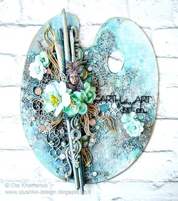 Decorative artist palette with white flowers, metallic details, and teal mixed media texture