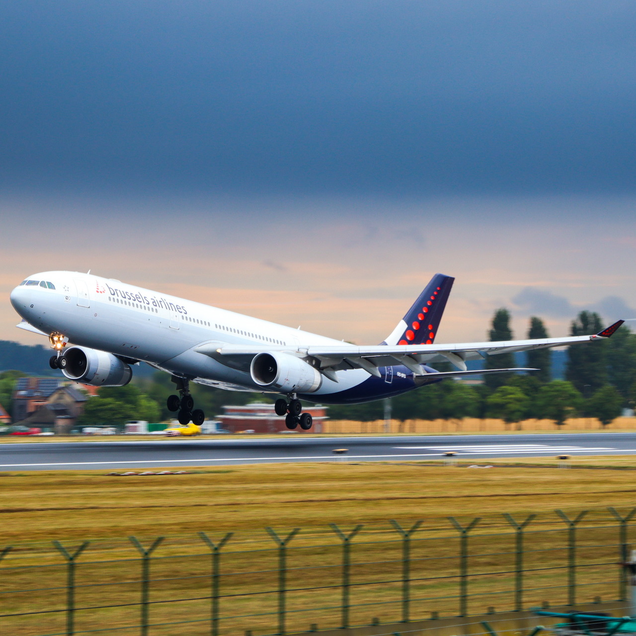 Brussels Airlines Airbus A330 taking off from an airport runway