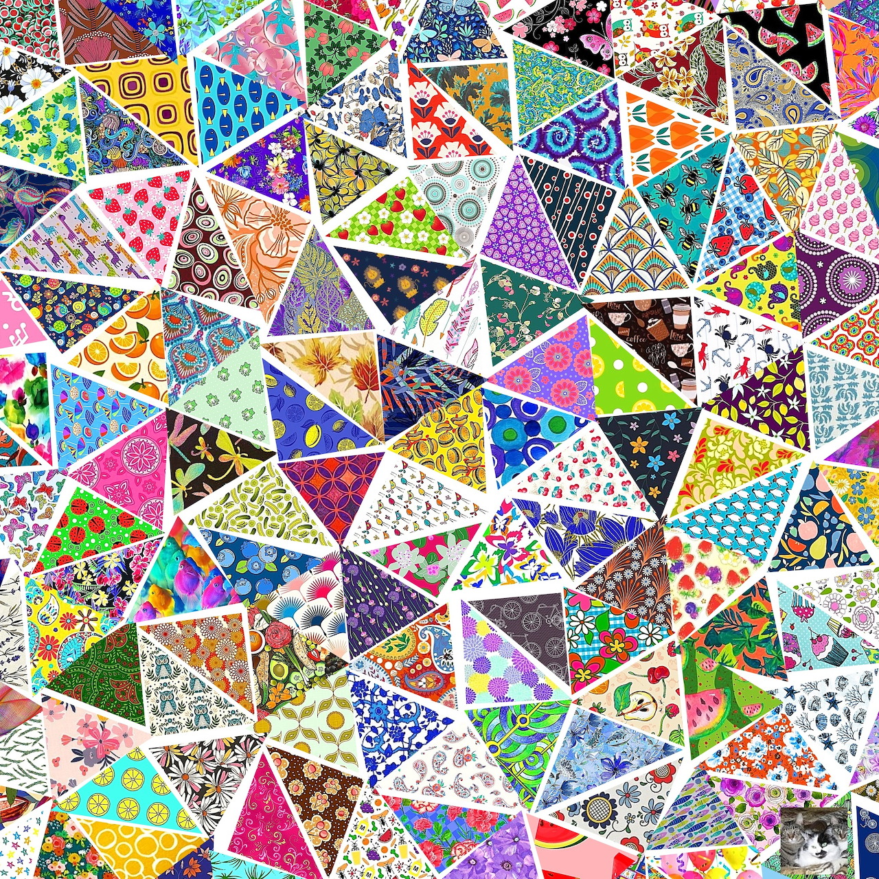 Dense collage of colorful overlapping triangles with varied patterns including flowers, dots, and geometric designs