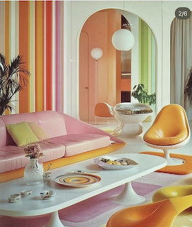 Retro 1970s living room with pink sofa, orange egg chairs, tulip coffee table, and colorful striped walls