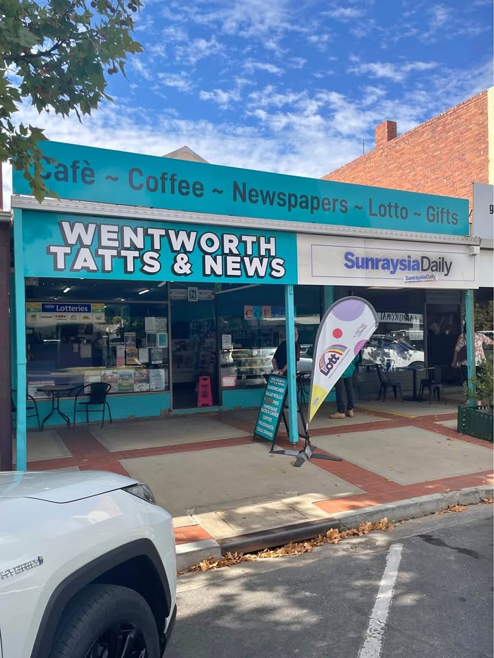 Wentworth Tatts & News storefront with turquoise signage on a street in New South Wales