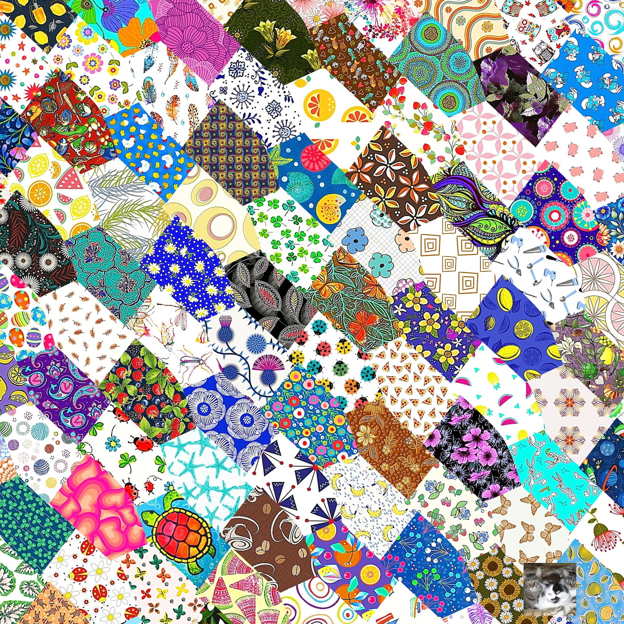 Colorful patchwork quilt with varied fabric patterns including flowers, dots, and geometric designs