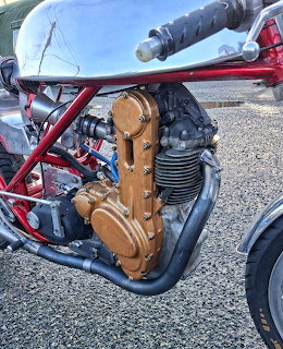 Vintage Seeley Condor G50 motorcycle showing bronze engine and red frame