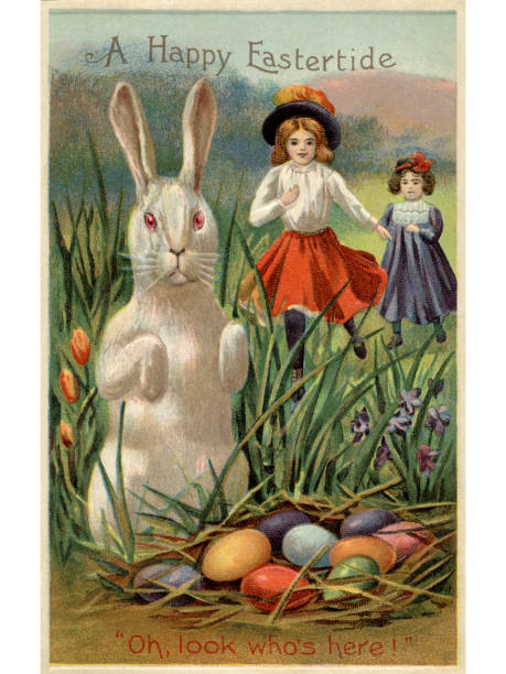 Easter bunny with colorful decorated eggs and spring flowers