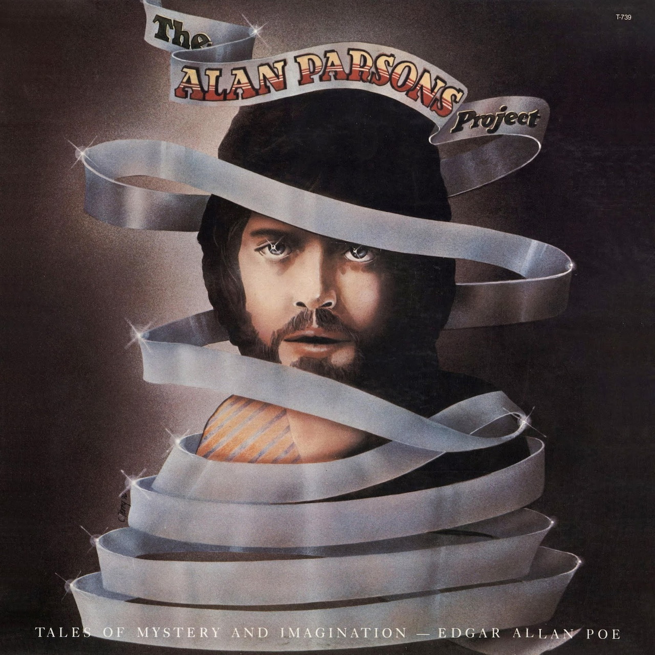 Album cover with a bearded man's face wrapped in silver ribbon beneath The Alan Parsons Project text