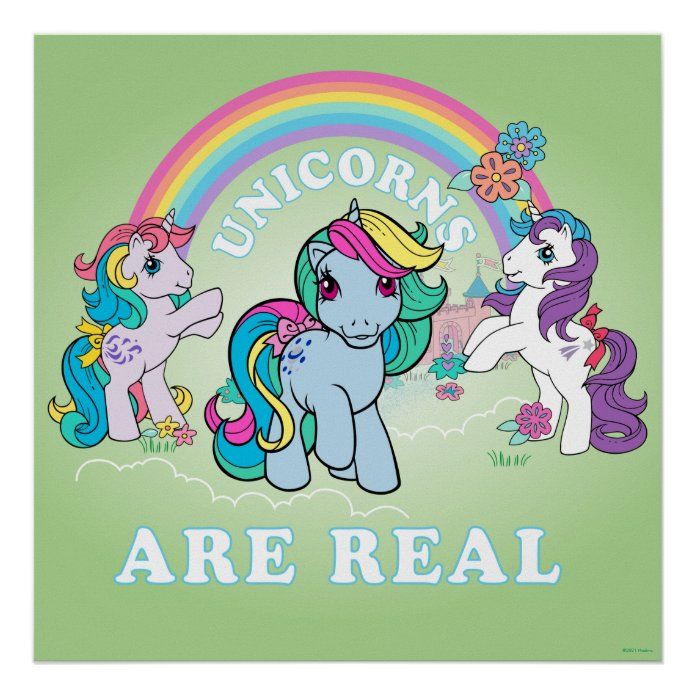 Three cartoon unicorns with colorful manes standing under a rainbow with flowers and text 'Unicorns Are Real'