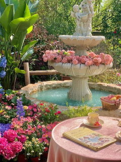 Garden Fountain With Pink Roses
