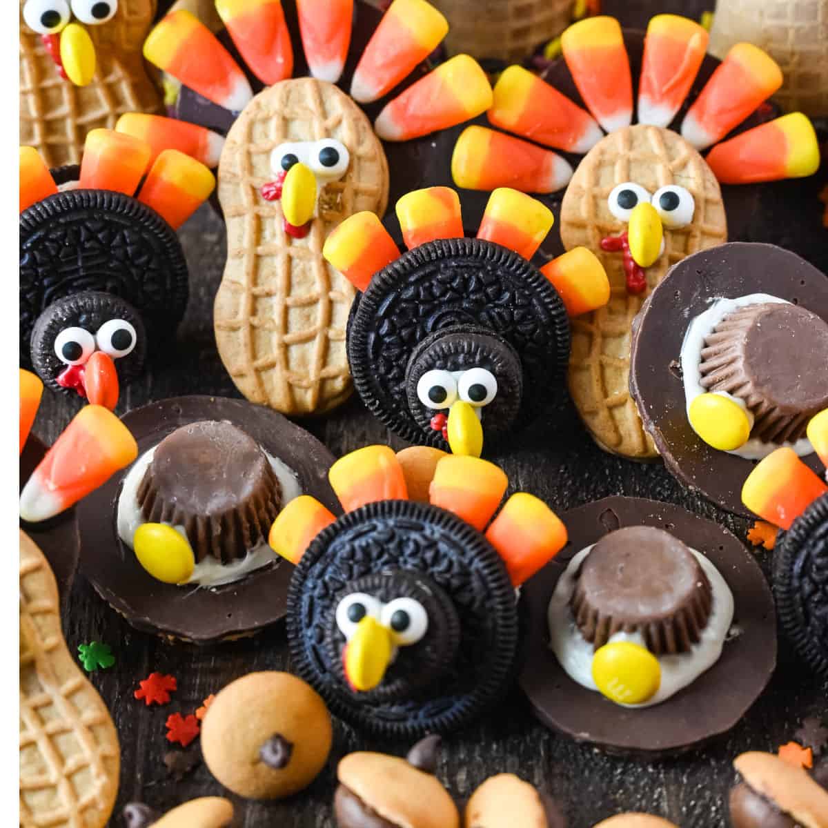 Thanksgiving turkey treats made with cookies, candy corn, peanut butter cups, and peanuts