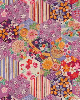 Decorative Japanese textile with colorful fan-shaped patches of flowers, stripes, and geometric patterns
