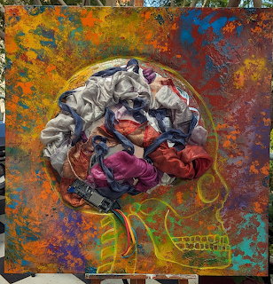 Abstract sculptural brain with colorful textures on vivid orange and purple painted canvas