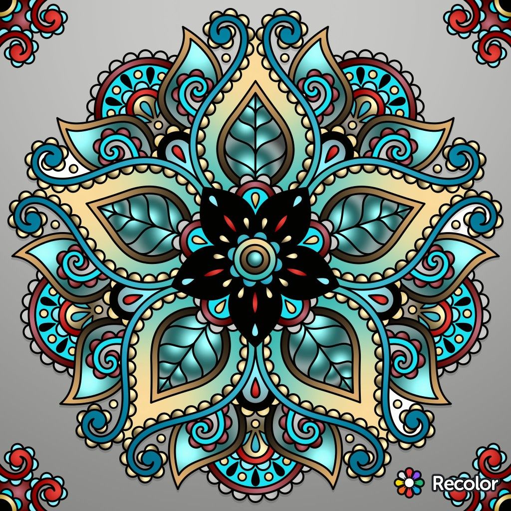 Ornate mandala with turquoise and cream symmetrical floral patterns and decorative swirls