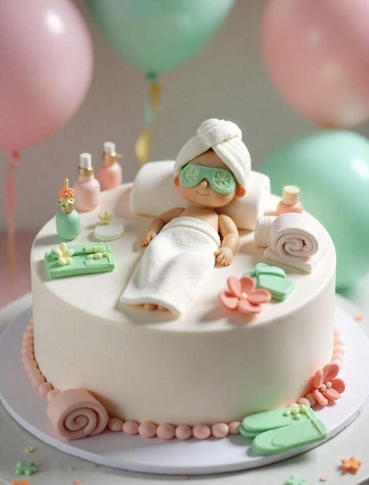 Spa-themed white cake with fondant woman in towel, face mask, flowers, and beauty accessories