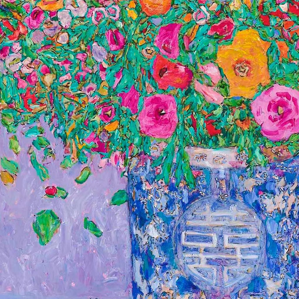 Impasto painting of pink, orange, and yellow ranunculus flowers in decorative blue ginger jar on lavender background
