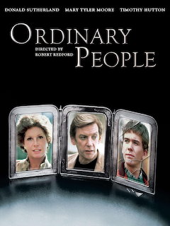 Ordinary People movie poster with three framed portraits of actors on dark background