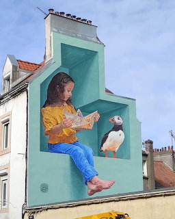 Girl with Puffin Street Mural