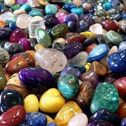 Close-up of colorful polished semi-precious stones and tumbled gemstones