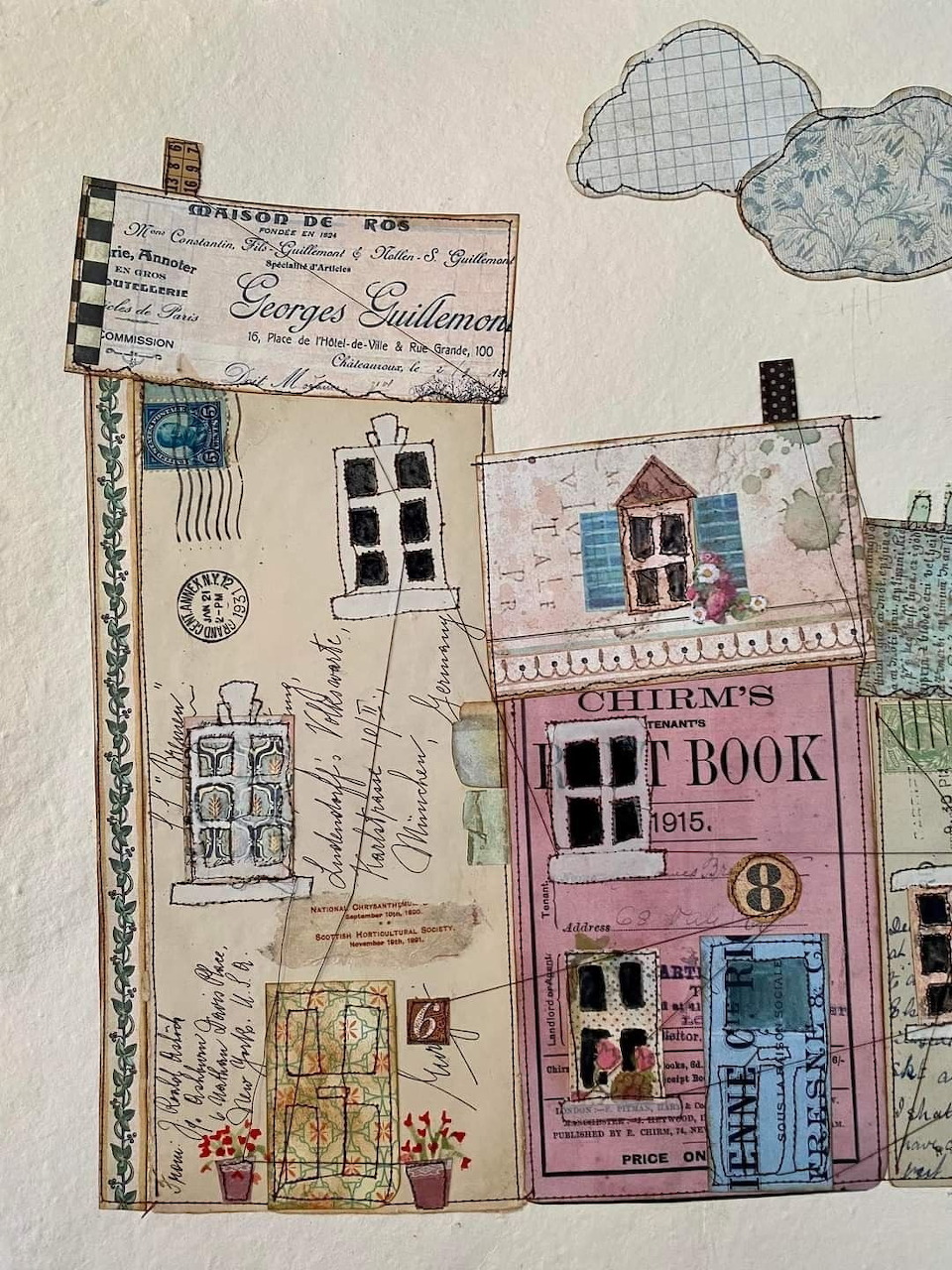 Mixed-media paper collage of colorful houses made from vintage papers, stamps, and patterned materials