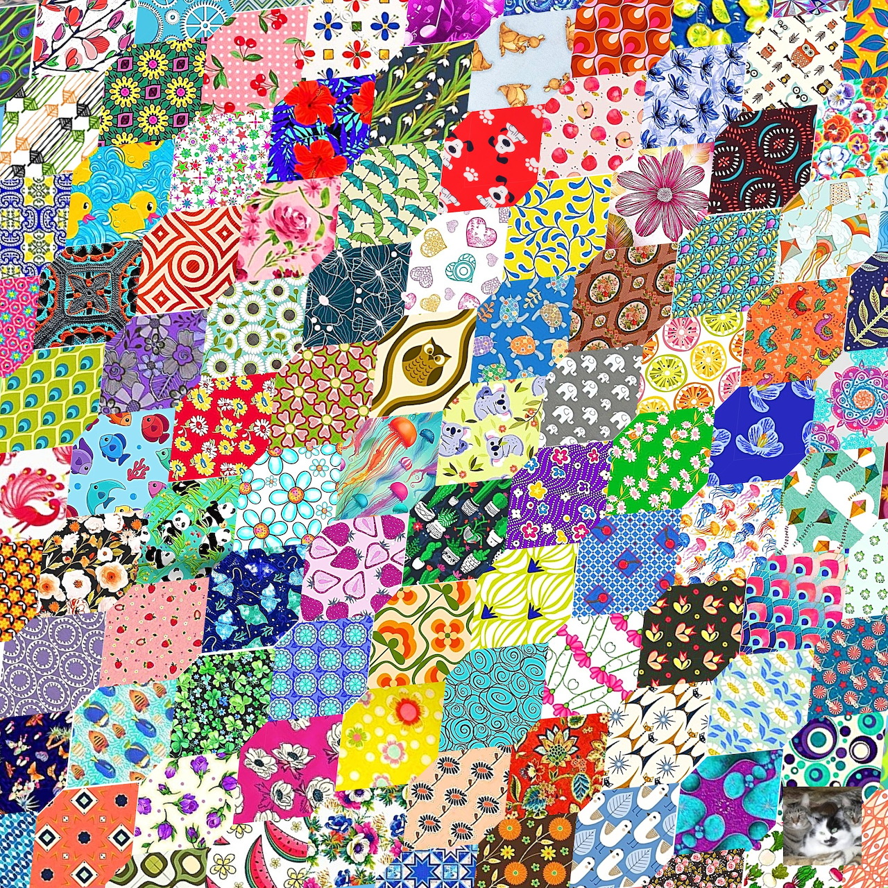 Colorful patchwork quilt with geometric patterns, flowers, and abstract designs in vibrant squares