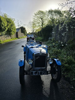 Vintage Blue Classic Car on Country Road