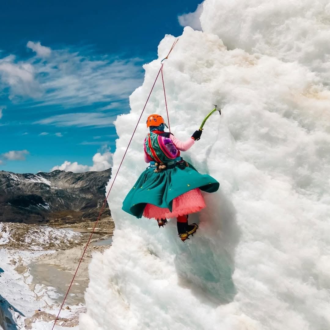 Woman Ice Climbing