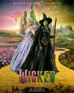 Wicked movie poster with two witches standing on yellow brick road before Emerald City