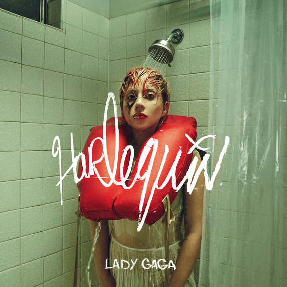 Woman in bright red costume posing in green-tiled shower with white text overlay reading Harlequin and Lady Gaga