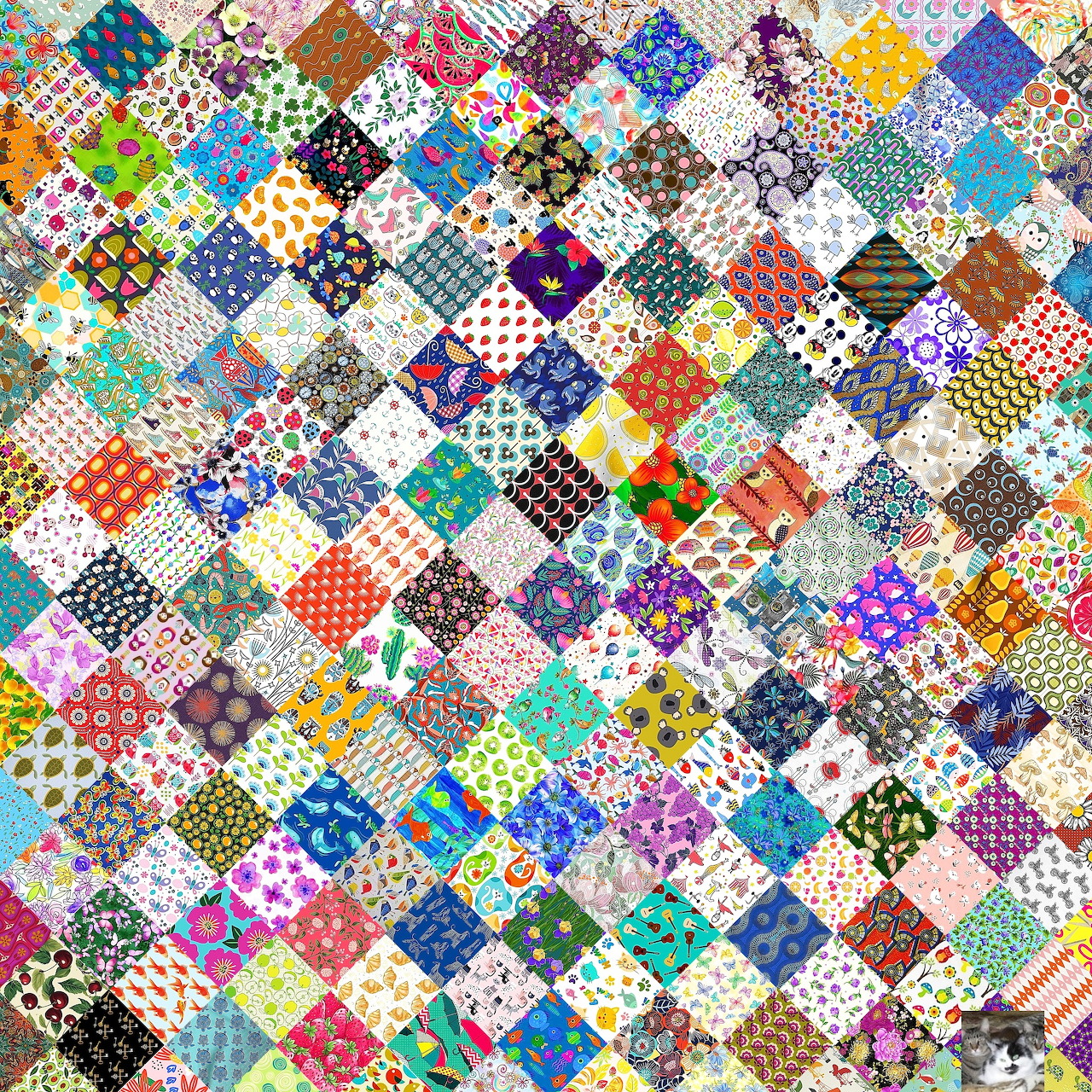 Colorful patchwork quilt with diamond patches in various patterns and colors arranged diagonally