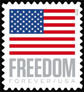 USPS Forever stamp with American flag and the word FREEDOM on white background