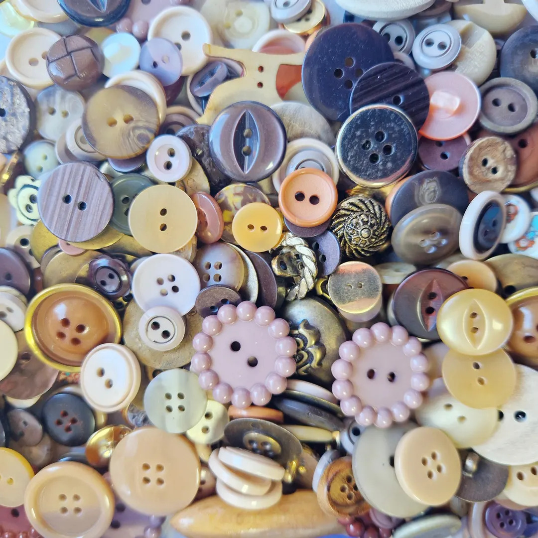 Colorful collection of various sewing buttons in different shapes, sizes and patterns