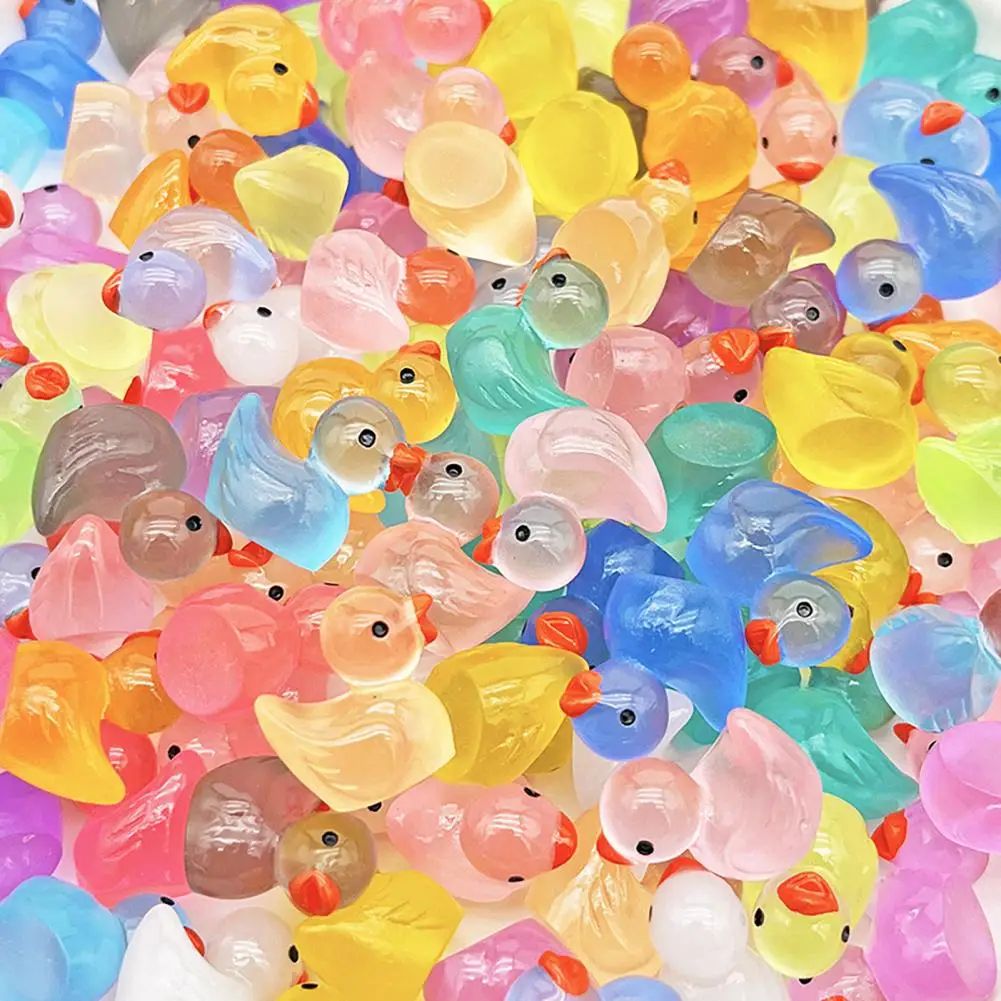Dense collection of colorful translucent rubber ducks in various bright colors