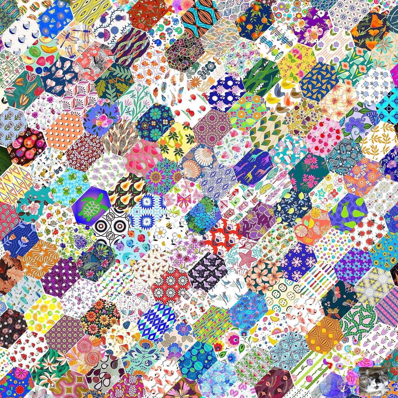 Colorful hexagonal patchwork quilt with diverse floral, geometric, and polka dot fabric patterns
