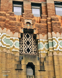 Art Deco building facade with geometric patterns and ornamental brick details in Detroit