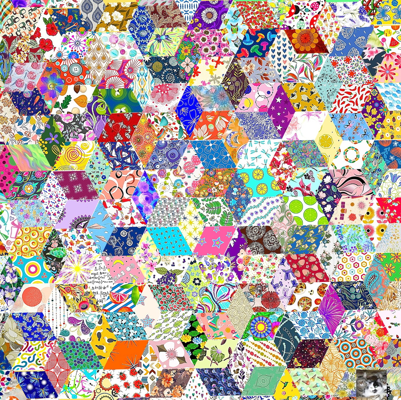 Dense patchwork of colorful hexagonal tiles with floral, geometric, and abstract patterns covering entire frame