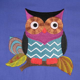 Embroidered Owl on Blue Background