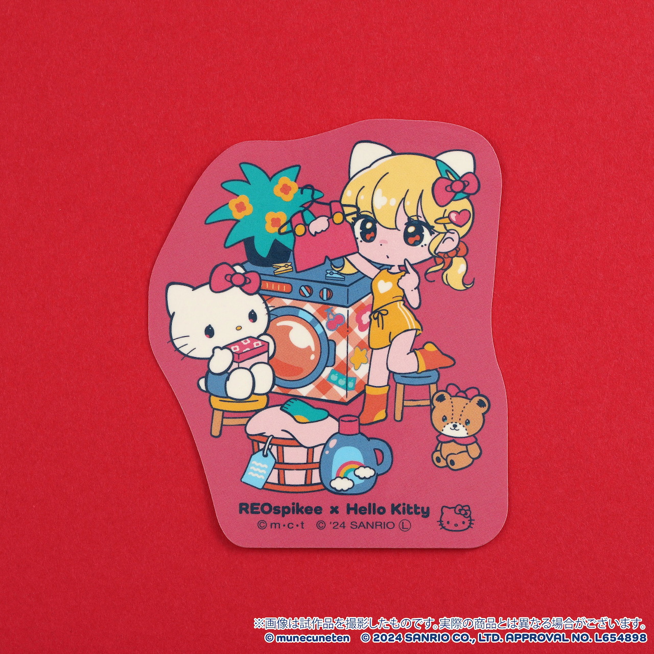 Anime character sticker with Hello Kitty on red background