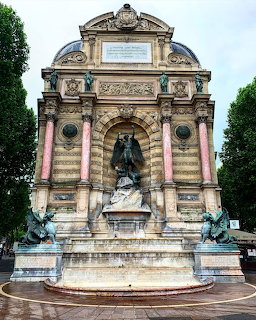 Fontaine Saint-Michel fountain monument in Paris with ornate stone architecture and sculptures
