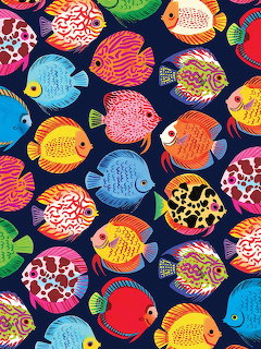 Colorful tropical fish with ornate patterns on dark blue background